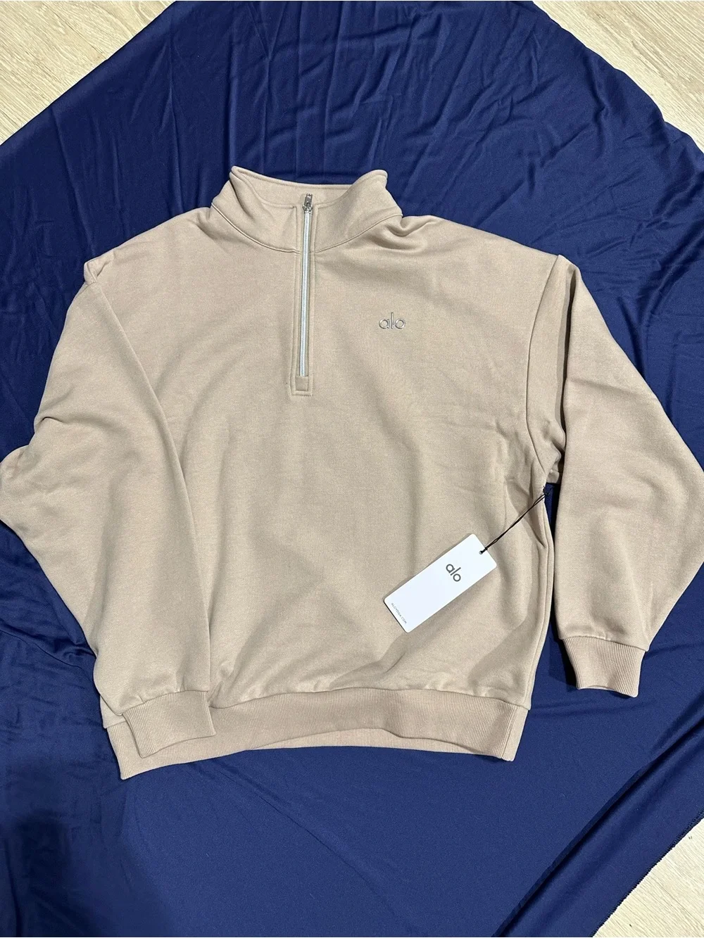 ALO Yoga Unisex Half-Zip Pullover Sweatshirt in Beige